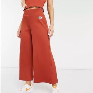 Nike | ribbed wide leg pants in rust | size: xs